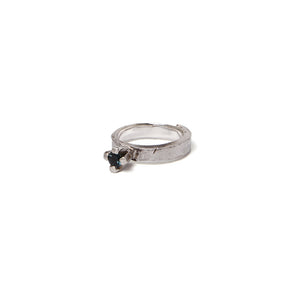 Small blue solitaire ring