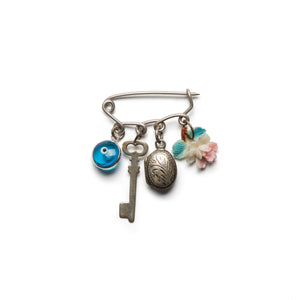 Safety pin charm brooch